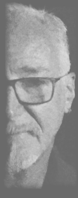 Black-and-white half-face portrait of Jeff Kossack in glasses